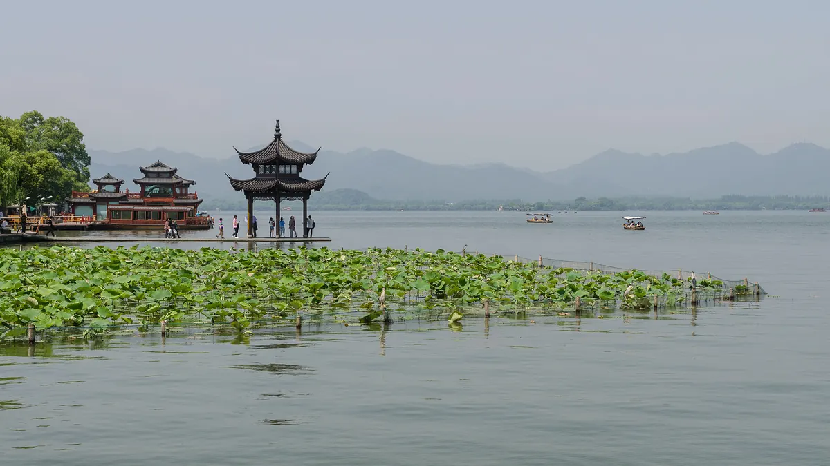 West Lake with pavilion and water lilies