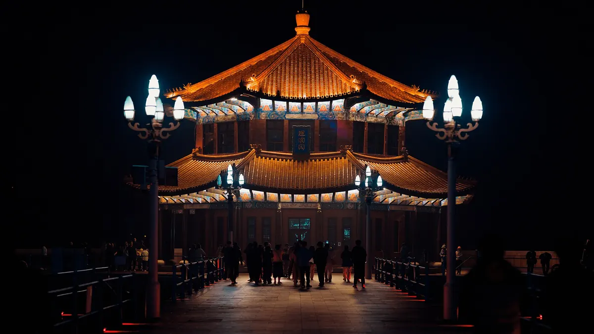 Huilan Pavilion at the end of Zhanqiao Pier at night